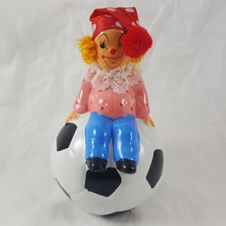 Clown Sitting On Soccer Ball Bank