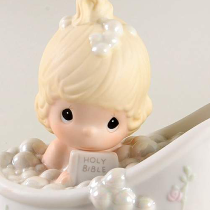 porcelain figurine depicting girl in bathtub