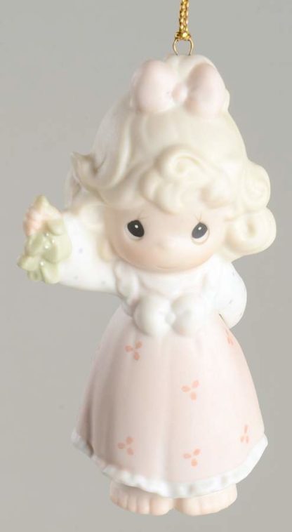 Precious Moments joy from Head to Misteltoe. Porcelain ornament of girl holding misteltoe