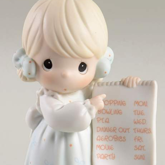 porcelain figurine depicts a girl with a notepad with schedule.