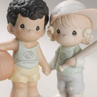 Precious Moments figurine depicts a boy (basketball) and girl (baseball) both holding hands and wearing Boys and Girls Club shirts