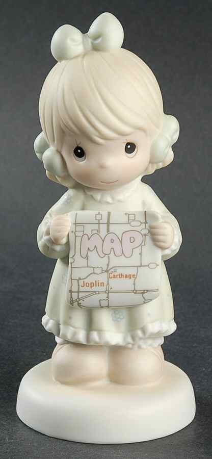 Precious Moments I would be lost without you #526142. This porcelain figurine depicts a girl checking a map.