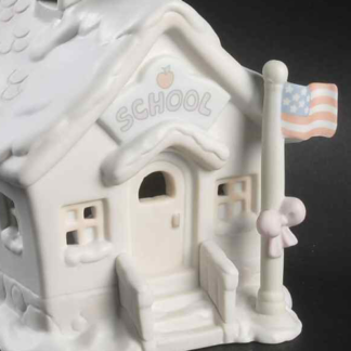 Porcelain Precious Moments Nightlight of a one-room schoolhouse with a flag.