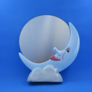 round mirror inset in crescent moon sitting on cloud