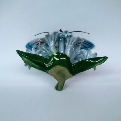Butterfly on flowers figurine - underside