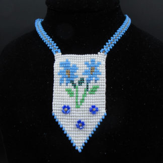 Native American hand-beaded pendant of flowers