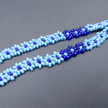 daisy chain beadwork in two shades of blue