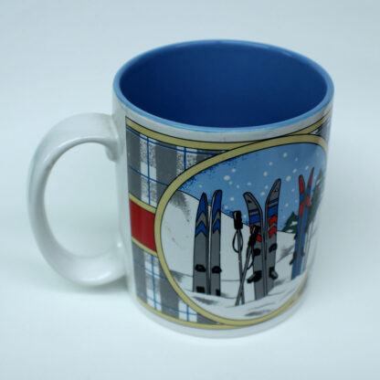 Novelty Mug, three pairs of skis in Snow scene, Grey plaid with red band round middle
