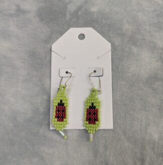 hand beaded earrings, ladybug on green.