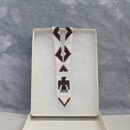 eagle necklace - panel. red black and white